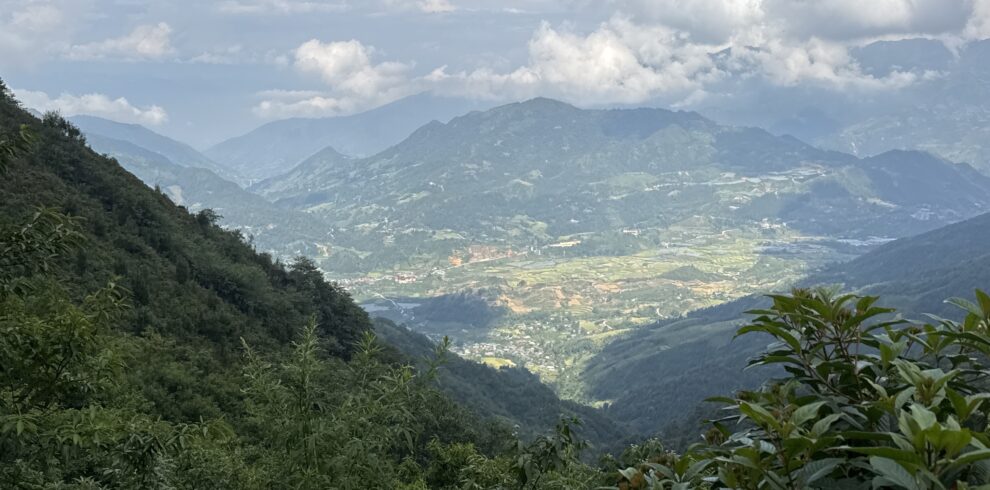 Panoramic mountain valley view from hiking trail near Sapa Vietnam