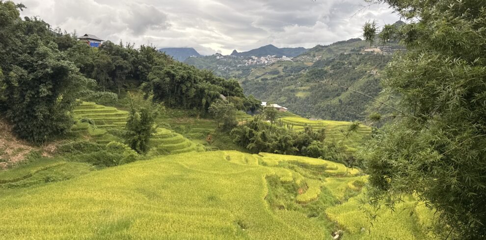 Mountain ridge trekking trail overlooking valleys near Sapa Vietnam